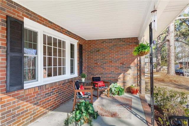 view of patio featuring a porch