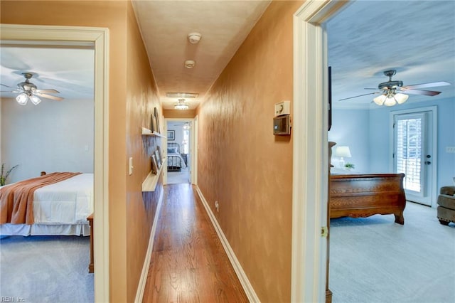 hall featuring hardwood / wood-style flooring