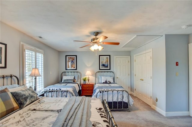 carpeted bedroom featuring ceiling fan