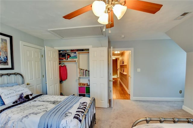 carpeted bedroom with ceiling fan