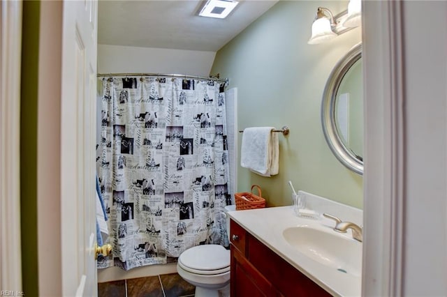 bathroom featuring toilet, tile patterned flooring, a shower with curtain, lofted ceiling, and vanity