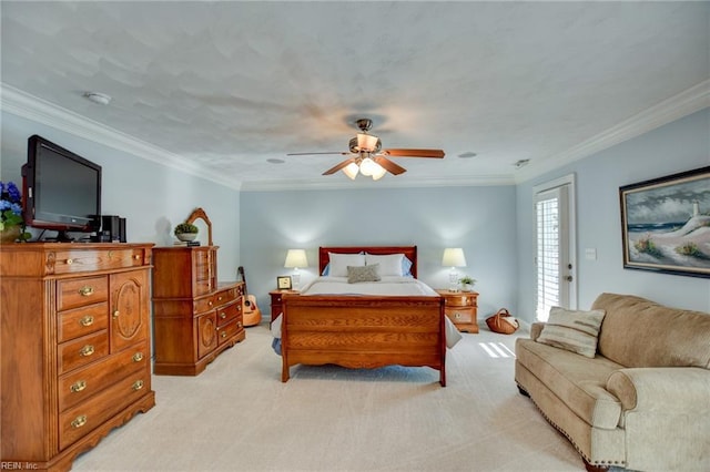 bedroom featuring ceiling fan, ornamental molding, and light carpet