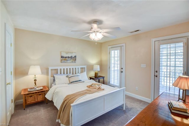 bedroom with ceiling fan, access to outside, and multiple windows