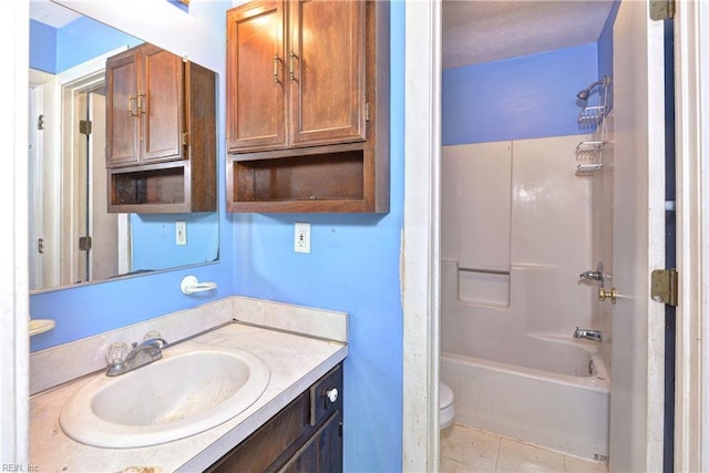 full bathroom featuring toilet, a textured ceiling, tile patterned flooring, shower / bath combination, and vanity