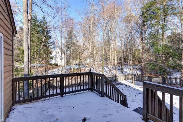 view of snow covered deck