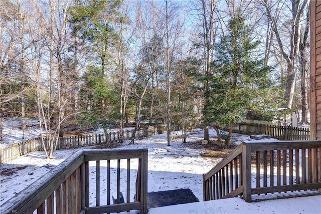 view of snow covered deck