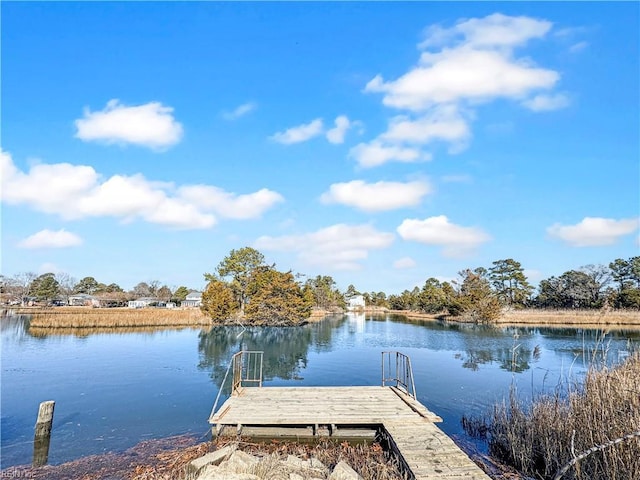 view of dock with a water view