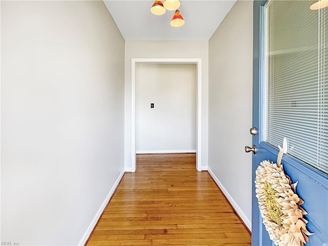 corridor featuring light wood-type flooring