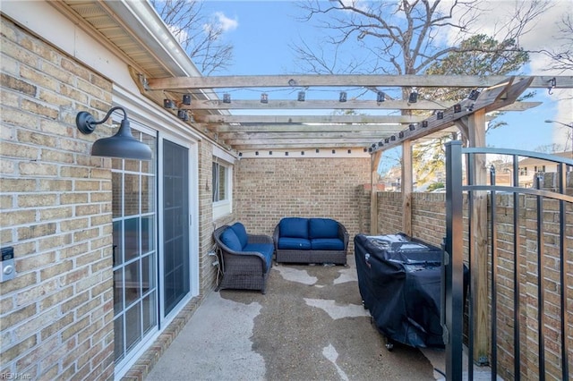 view of patio featuring a grill, outdoor lounge area, and a pergola