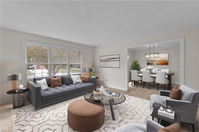 living room with light hardwood / wood-style flooring