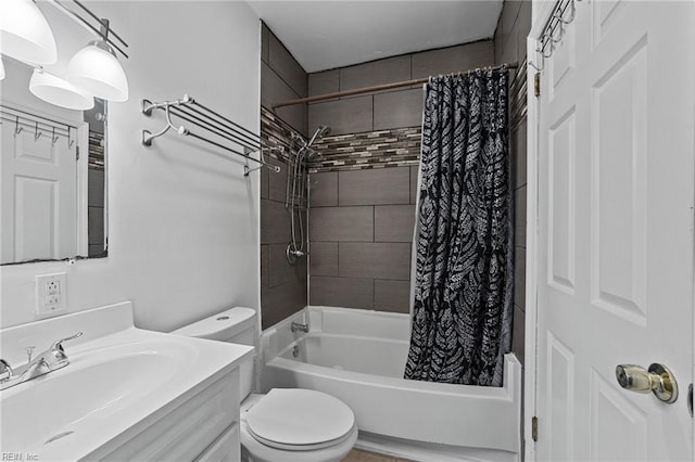 full bathroom featuring shower / bath combo, toilet, and vanity