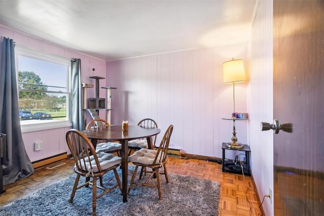 dining area with parquet floors