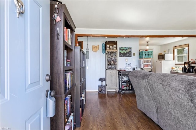 living room with dark wood-type flooring