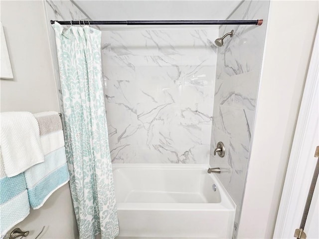 bathroom featuring shower / tub combo with curtain