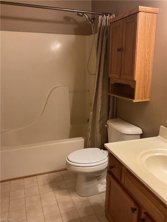 full bathroom featuring shower / bathtub combination with curtain, tile patterned flooring, vanity, and toilet