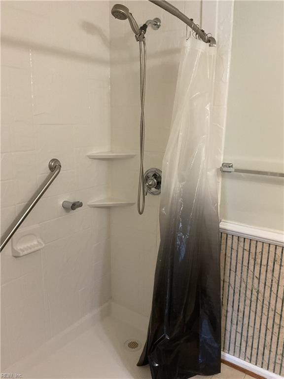 bathroom featuring curtained shower