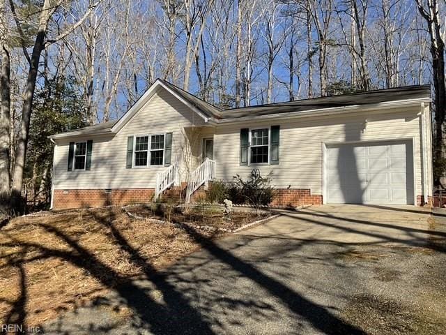 single story home with a garage