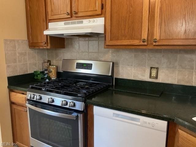 kitchen with stainless steel gas range oven, dishwasher, and backsplash