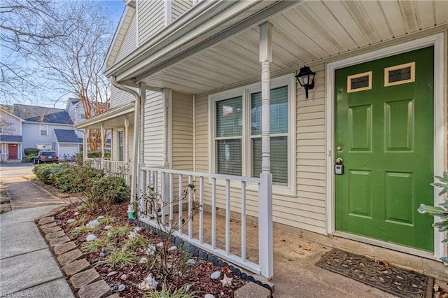 entrance to property with a porch