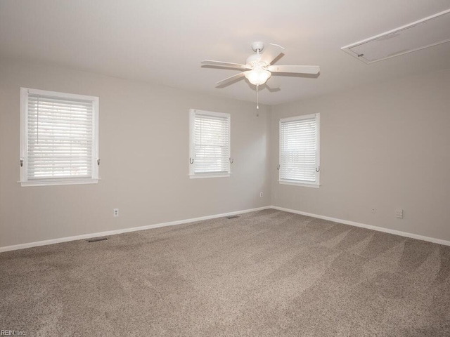 carpeted empty room with ceiling fan