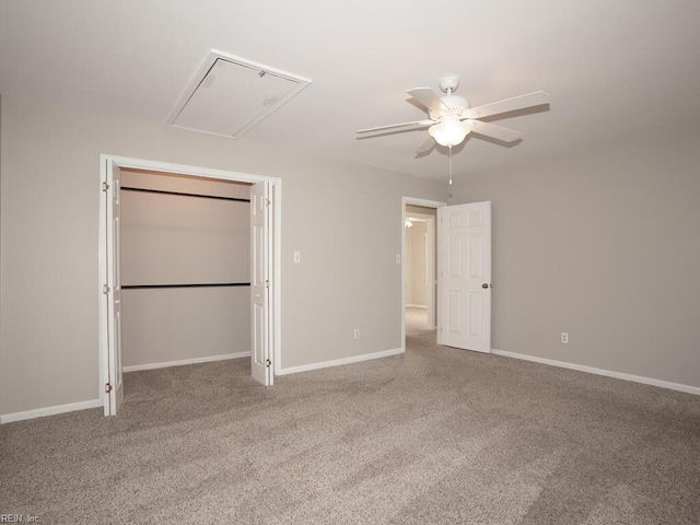 unfurnished bedroom featuring carpet floors, a closet, and ceiling fan