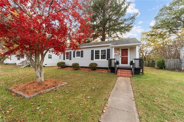 view of front of property featuring a front lawn and a porch