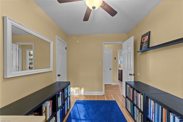 corridor featuring light hardwood / wood-style floors