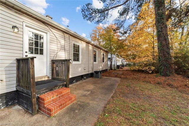 view of property exterior with a patio