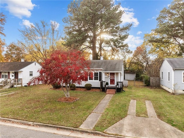 view of front of home with a front lawn