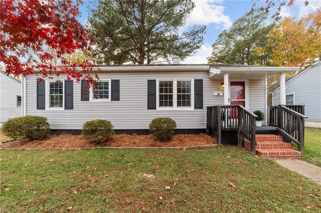 view of front of property with a front yard