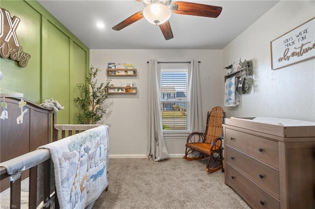 carpeted bedroom featuring ceiling fan