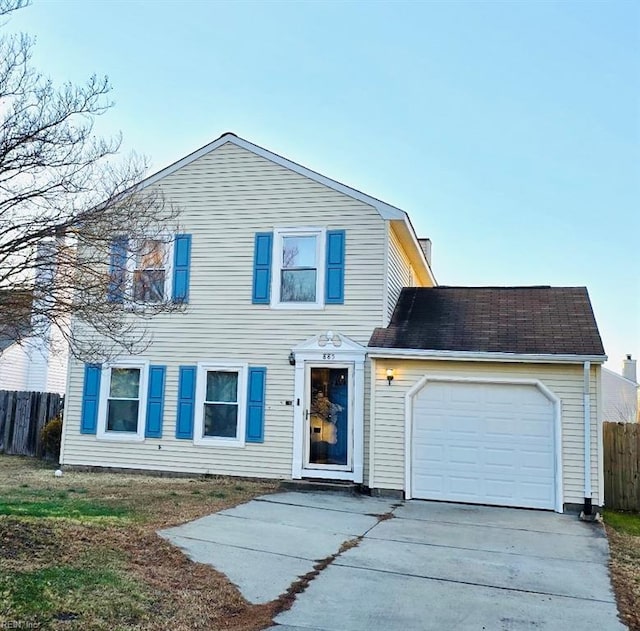 view of front of property with a garage