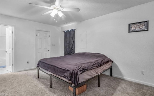 carpeted bedroom featuring ceiling fan