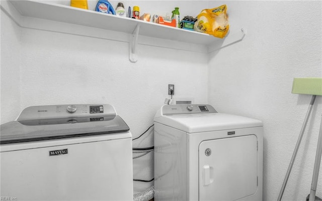 laundry area featuring separate washer and dryer