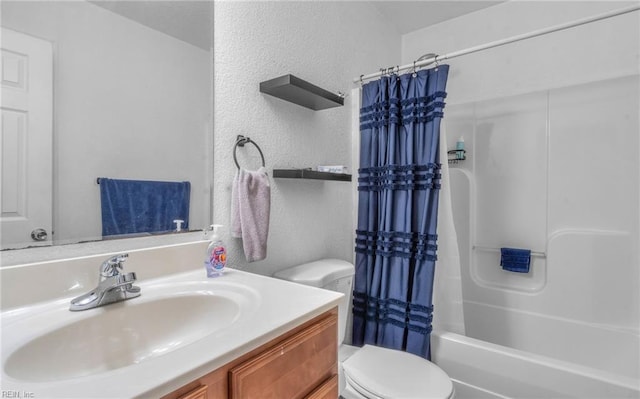 full bathroom featuring vanity, toilet, and shower / bath combo