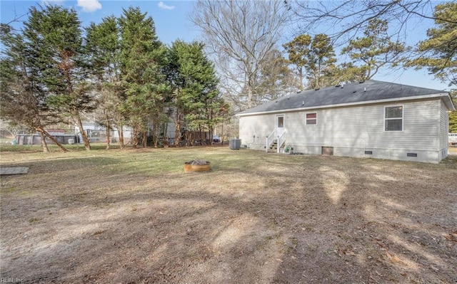 view of yard with central AC