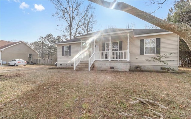 view of front of home with a front lawn and covered porch