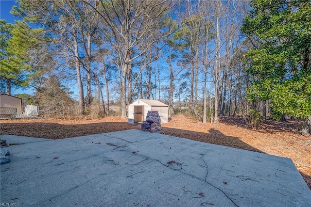 exterior space featuring a patio area and a storage unit