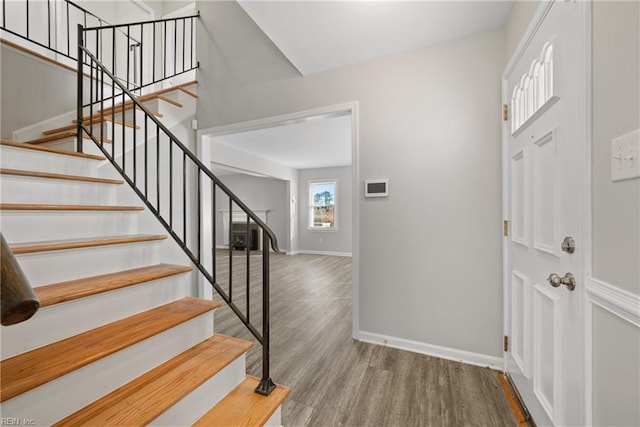 entrance foyer featuring hardwood / wood-style flooring