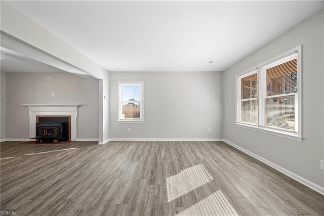 unfurnished living room featuring light wood-type flooring