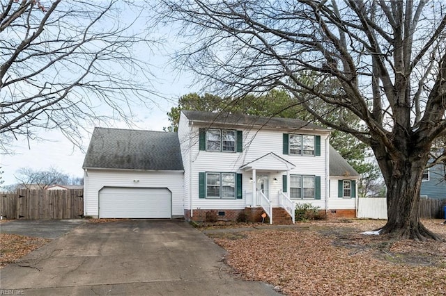 colonial inspired home with a garage