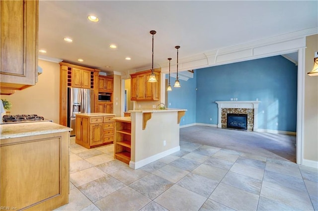 kitchen featuring stainless steel appliances, a breakfast bar area, hanging light fixtures, a kitchen island, and crown molding