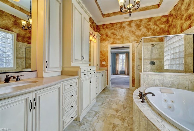 bathroom featuring plus walk in shower, vanity, crown molding, and a chandelier