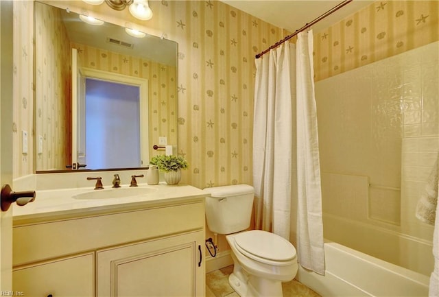 full bathroom with shower / bath combo, tile patterned flooring, vanity, and toilet