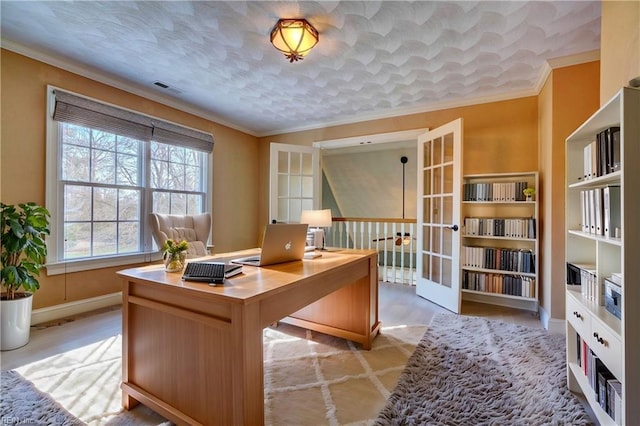 office area featuring french doors and crown molding