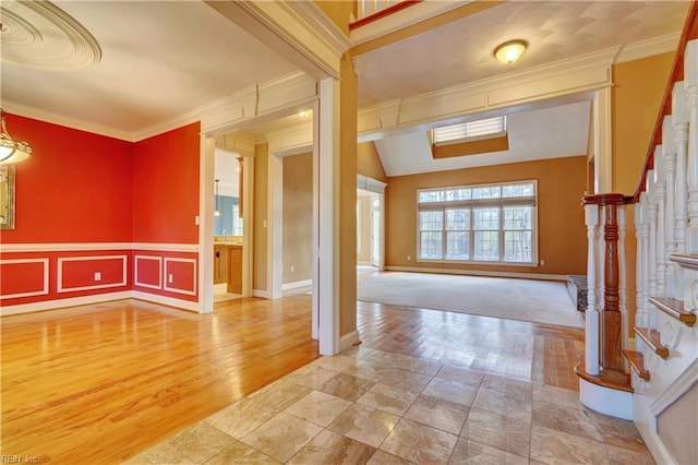 unfurnished room featuring ornamental molding