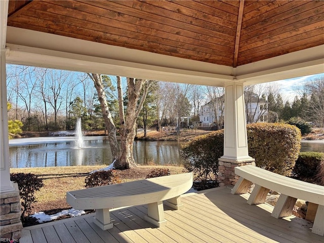 deck featuring a water view