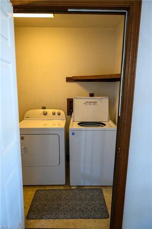 laundry area featuring independent washer and dryer