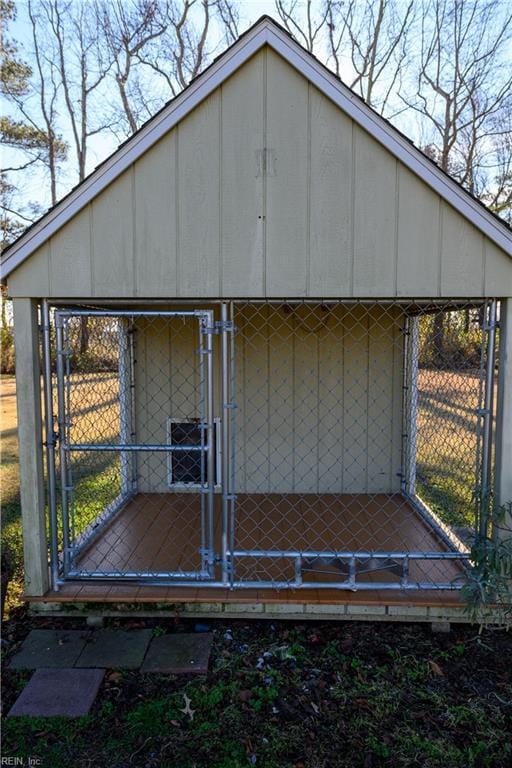 back of property with an outbuilding