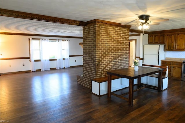 kitchen with crown molding, white refrigerator, dark wood-type flooring, and ceiling fan